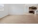 Spacious living room with neutral paint, wood-look tile flooring and modern lighting at 22563 W Pontiac Dr, Surprise, AZ 85387