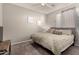 King bedroom with window and TV stand at 2527 W Kit Carson Trl, Anthem, AZ 85086