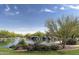 Relaxing community lake with a waterfall feature at 2527 W Kit Carson Trl, Anthem, AZ 85086