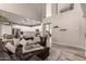Relaxing living room with comfortable sectional sofa and adjacent kitchen view at 2527 W Kit Carson Trl, Anthem, AZ 85086