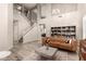 Open living area with high ceilings, hardwood floors, and a grand staircase at 2527 W Kit Carson Trl, Anthem, AZ 85086