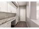 Home office with built-in cabinets and granite countertop at 2527 W Kit Carson Trl, Anthem, AZ 85086
