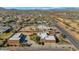 An aerial view of a large property with a main house and several outbuildings at 2625 W Desert Hills Dr, Phoenix, AZ 85086