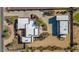 An overhead view of the house and surrounding landscape, showing the layout and features at 2625 W Desert Hills Dr, Phoenix, AZ 85086