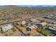 Aerial view of the house and surrounding neighborhood in a desert setting at 2625 W Desert Hills Dr, Phoenix, AZ 85086
