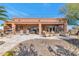 Large backyard with extended covered patio, fire pit, and seating area at 2625 W Desert Hills Dr, Phoenix, AZ 85086