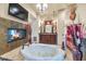 Large bathroom with a luxurious jetted tub and double vanity at 2625 W Desert Hills Dr, Phoenix, AZ 85086