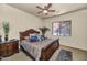 Spacious bedroom with a king-size bed and decorative pillows at 2625 W Desert Hills Dr, Phoenix, AZ 85086