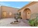 Peaceful courtyard with a central fountain and access to the house at 2625 W Desert Hills Dr, Phoenix, AZ 85086