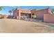 Well-maintained home exterior with desert landscaping and a large driveway at 2625 W Desert Hills Dr, Phoenix, AZ 85086