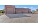 Large four-car garage with extra-wide driveway and ample parking at 2625 W Desert Hills Dr, Phoenix, AZ 85086