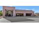 Massive garage with gym equipment, storage, and multiple bays at 2625 W Desert Hills Dr, Phoenix, AZ 85086