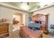 Bright home office features a large desk and built-in shelving at 2625 W Desert Hills Dr, Phoenix, AZ 85086