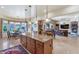 Spacious kitchen with granite island, ample cabinetry, and stainless steel appliances at 2625 W Desert Hills Dr, Phoenix, AZ 85086