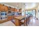 Open kitchen features a large island, stainless steel appliances, and lots of cabinet space at 2625 W Desert Hills Dr, Phoenix, AZ 85086