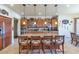 Large kitchen with island and extensive wood cabinetry at 2625 W Desert Hills Dr, Phoenix, AZ 85086