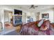 Luxurious main bedroom featuring a fireplace and a large TV at 2625 W Desert Hills Dr, Phoenix, AZ 85086