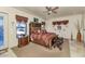 Spacious main bedroom with a king-size bed and fireplace at 2625 W Desert Hills Dr, Phoenix, AZ 85086