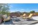 Relaxing rooftop deck with mountain views, seating, and multiple tables at 2625 W Desert Hills Dr, Phoenix, AZ 85086