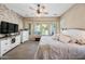 Main bedroom with large windows and stylish decor at 27434 N 130Th Dr, Peoria, AZ 85383