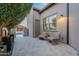 Outdoor patio featuring cozy seating, stylish tile flooring, and serene backyard access at 290 E Tangerine Path, Queen Creek, AZ 85140