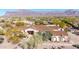 Aerial view of luxury home with mountain backdrop at 3205 S Ponderosa Dr, Gold Canyon, AZ 85118