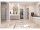 Elegant bathroom with soaking tub, double vanity, and walk-in shower at 3205 S Ponderosa Dr, Gold Canyon, AZ 85118