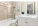 Clean bathroom with a shower/tub combo, toilet and white vanity at 3205 S Ponderosa Dr, Gold Canyon, AZ 85118