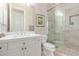 Modern bathroom with white vanity and a glass shower enclosure at 3205 S Ponderosa Dr, Gold Canyon, AZ 85118
