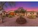 Luxury home exterior at sunset with desert landscaping at 3205 S Ponderosa Dr, Gold Canyon, AZ 85118