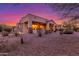 Luxury home exterior at sunset with desert landscaping at 3205 S Ponderosa Dr, Gold Canyon, AZ 85118