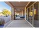 Covered patio with seating area and views of the desert landscape at 3205 S Ponderosa Dr, Gold Canyon, AZ 85118