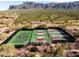 Tennis and pickleball courts with mountain views at 3205 S Ponderosa Dr, Gold Canyon, AZ 85118