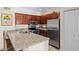 Modern kitchen with stainless steel appliances and granite counters at 4848 N 36Th St # 222, Phoenix, AZ 85018