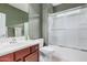 Bathroom featuring an enclosed shower, a vanity with a large mirror, and a toilet at 6546 W Georgetown Way, Florence, AZ 85132