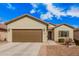 Charming single-story home with a two-car garage, desert landscaping, and a welcoming entrance at 6546 W Georgetown Way, Florence, AZ 85132