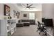 Cozy bedroom with comfortable seating and built-in shelving at 6943 N 88Th Dr, Glendale, AZ 85305