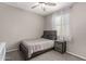 Bright bedroom with a double bed and a modern nightstand at 6943 N 88Th Dr, Glendale, AZ 85305