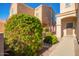 Landscaped front yard with a walkway leading to the front door at 7046 W Mercer Ln, Peoria, AZ 85345