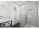 Elegant bathroom with marble shower and black hexagon floor tile at 8214 E Northland Dr, Scottsdale, AZ 85251