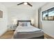 Bright bedroom with a modern bed and geometric wall design at 8214 E Northland Dr, Scottsdale, AZ 85251