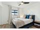 Well-lit bedroom with a full bed and a window offering natural light at 8214 E Northland Dr, Scottsdale, AZ 85251