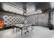 Finished garage converted into a game room with ping pong table at 8214 E Northland Dr, Scottsdale, AZ 85251