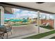 View of a refreshing pool and colorful mural from covered patio at 8214 E Northland Dr, Scottsdale, AZ 85251