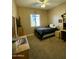 Spacious bedroom featuring a comfortable bed and a workspace at 861 E Toledo St, Gilbert, AZ 85295