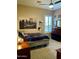 Comfortable bedroom with a bed and city skyline art at 861 E Toledo St, Gilbert, AZ 85295