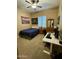 Bedroom with a double bed, desk and ceiling fan at 861 E Toledo St, Gilbert, AZ 85295