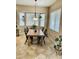 Cozy dining area with wooden table, black chairs and bright natural light at 861 E Toledo St, Gilbert, AZ 85295