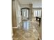 Open foyer leading to the living area with large ceramic tiling at 861 E Toledo St, Gilbert, AZ 85295