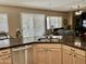 Kitchen sink overlooking the breakfast nook and living room at 861 E Toledo St, Gilbert, AZ 85295